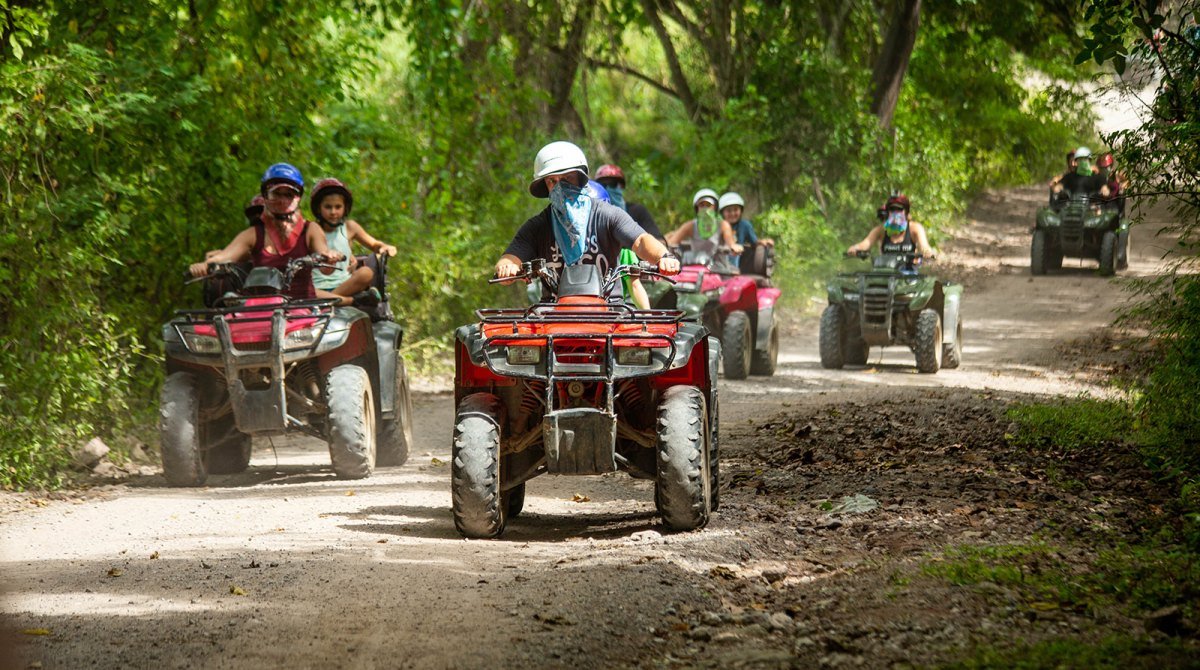 Line of ATVs on the dirt track above Puerto Vallarta