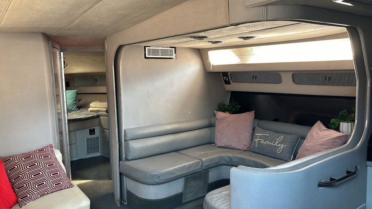 The air-conditioned cabin lounge of a Sea Ray 46 motor yacht, one of the lowest-priced yacht rentals in Puerto Vallarta
