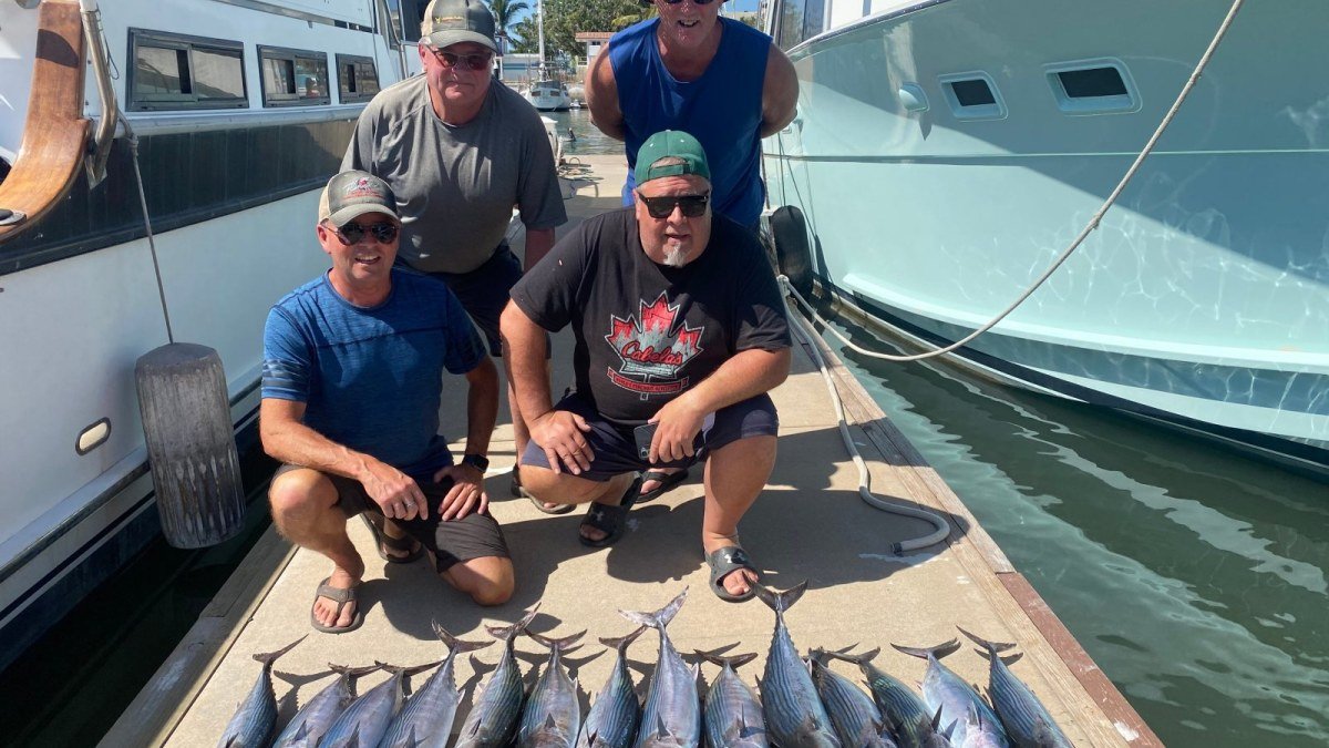 A charter group with a full lineup of bonito and tuna on the dock at Marina Nuevo Vallarta after a morning of fishing in Puerto Vallarta