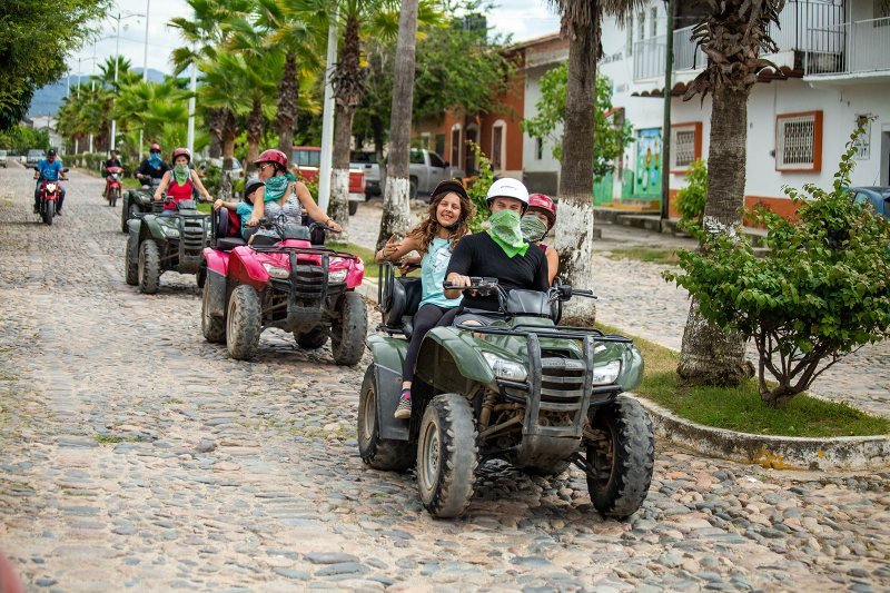 ATV group riding through the cobblestone streets of Las Palmas de Arriba