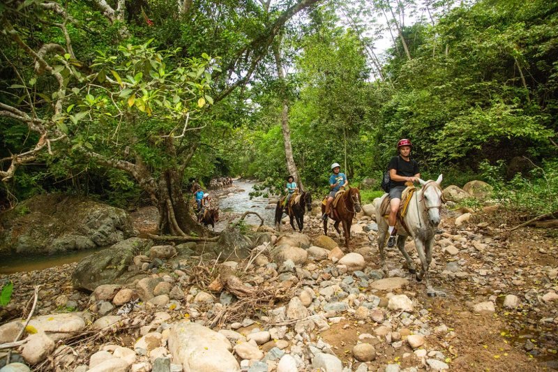 Horseback riding tour climbing into the mountains above Puerto Vallarta