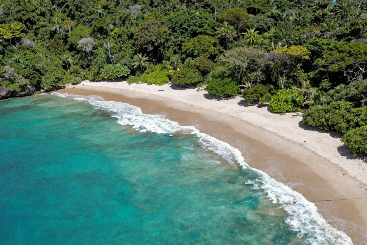 Aerial view of the beach and turquoise water at Playa La Lancha
